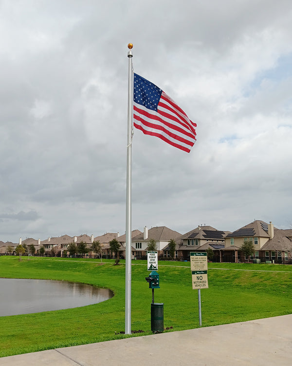 One-Piece Tapered Commercial Aluminum Flagpole – 25' x 6'' x .188''– External rope windloading at 253 MPH unflagged.