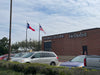 35'x7" bronze anodized flagpoles. 5'x8' flags.