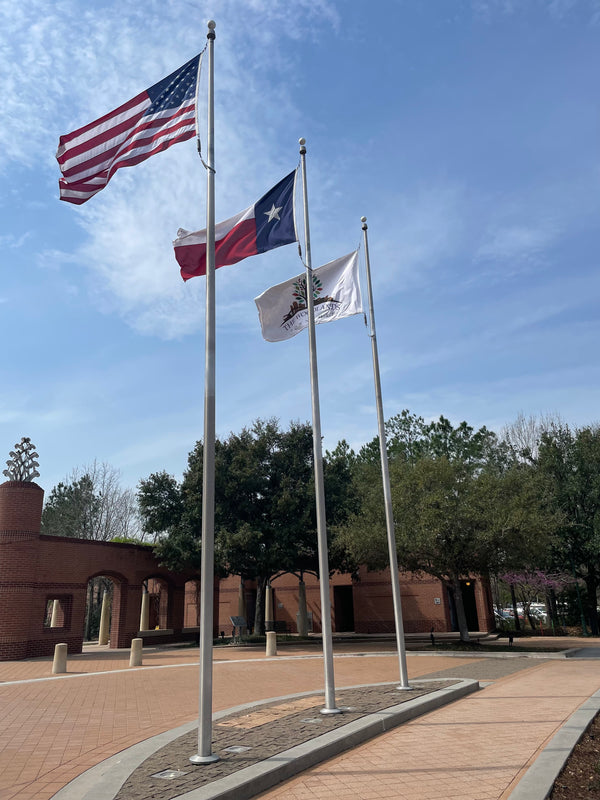 35' x 7'' x .188" 2-pc. tapered aluminum commercial flagpole. External rope windloading at 187 MPH unflagged.