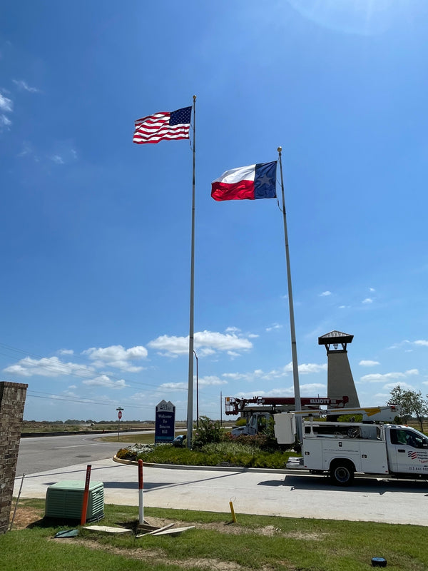 80' x 12'' x .375" 4-piece tapered aluminum commercial flagpole. External rope windloading is 144 MPH unflagged.