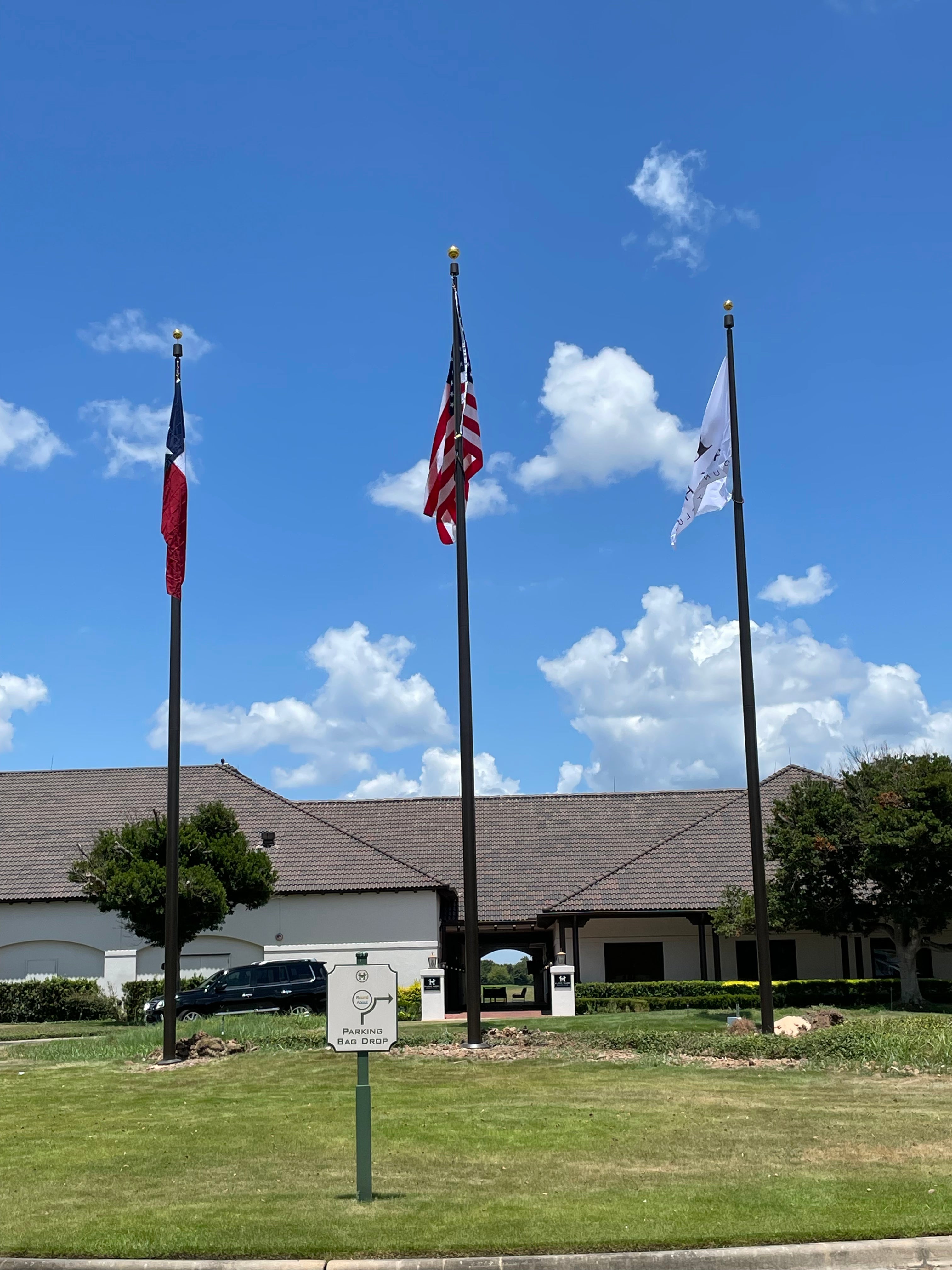 1-50'/2-40'. Bronze finish. Flying 8'x12' U.S., 6'x10' Texas and Corporate flags.